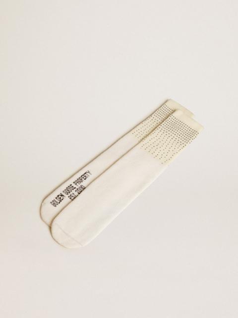 Worn-white socks with applied crystals