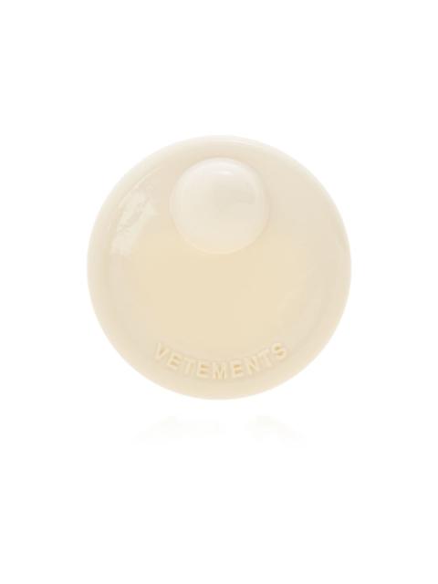 embossed-logo brooch