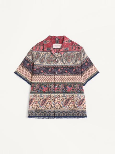 BOWLING SHIRT IN COTTON MUSLIN WITH VOYAGE IMAGINAIRE PRINT AND PASSEMENTERIE TRIMS