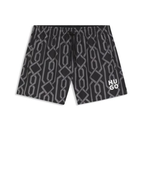 SWIM SHORTS WITH ALL-OVER PRINT