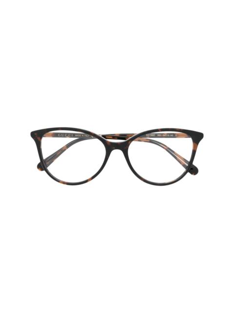 tortoiseshell round-frame glasses