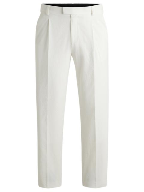 SLIM-FIT TROUSERS IN SEERSUCKER
