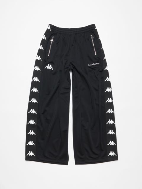 Relaxed fit trousers - Acne Studios x Kappa - Black