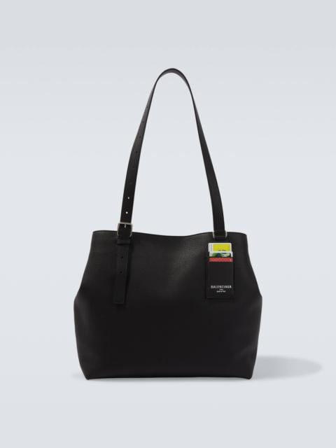 Credit leather tote bag