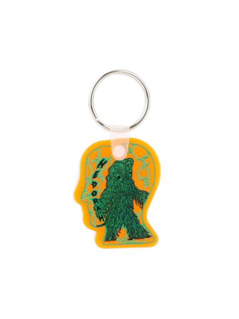Brain Dead x Godzilla Hedorah Logohead Keychain - Clear Orange