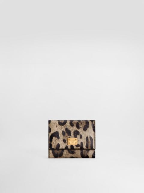 Leopard-print wallet in dauphine calfskin
