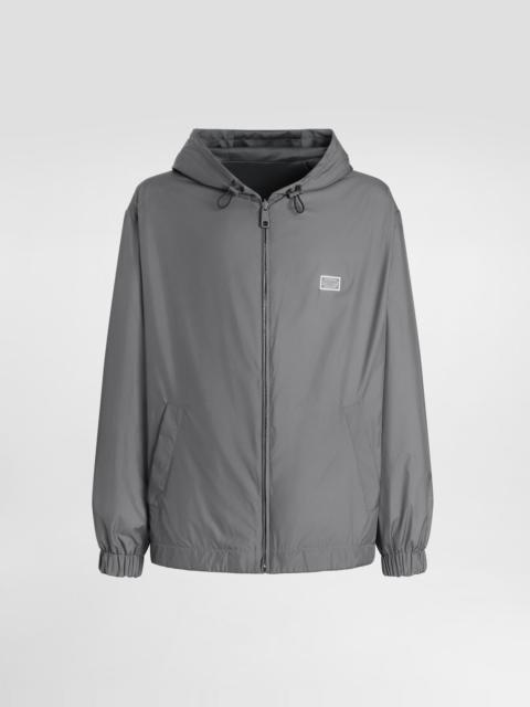 Technical fabric sports jacket with hood