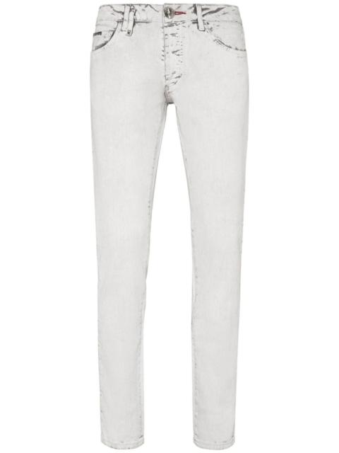 skull-stamp washed skinny jeans
