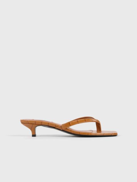 Croco-embossed heeled flip flops tangerine