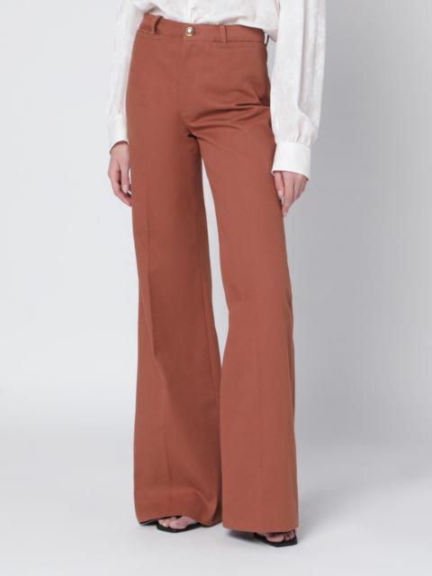 Flared cotton trousers in nougat colour