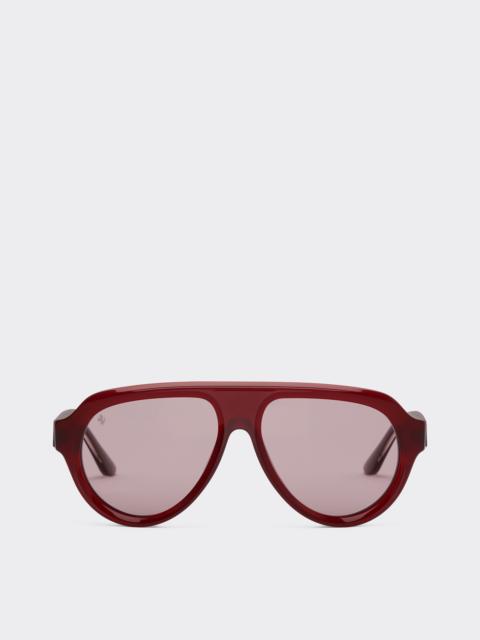 Ferrari sunglasses in opal red acetate with gold mirrored purple polarized lenses
