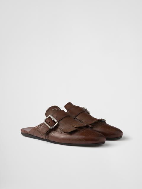 Shuffle fringed leather mules