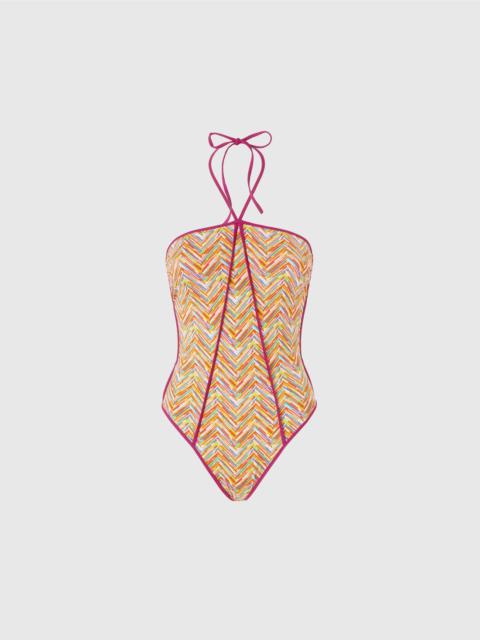 Reversible one-piece swimsuit with print and contrasting piping