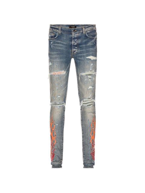 flame-print ripped jeans