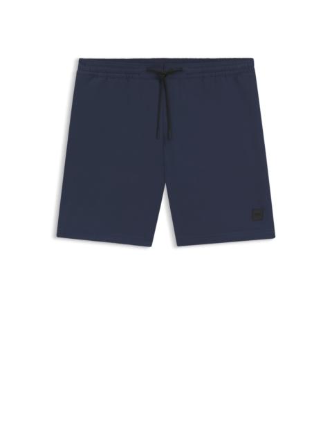 PACKABLE SWIM SHORTS WITH LOGO BADGE