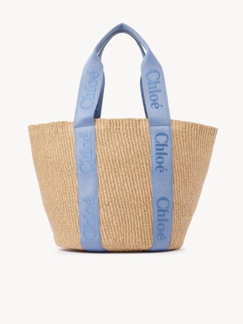 LARGE WOODY BASKET IN NATURAL FIBERS