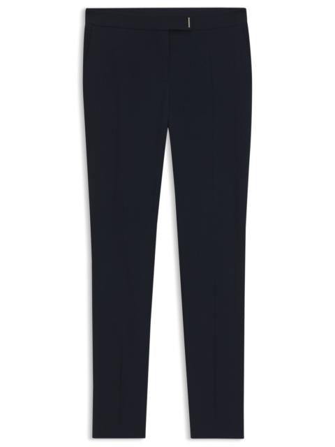 SLIM-FIT TROUSERS WITH SLIT HEMS