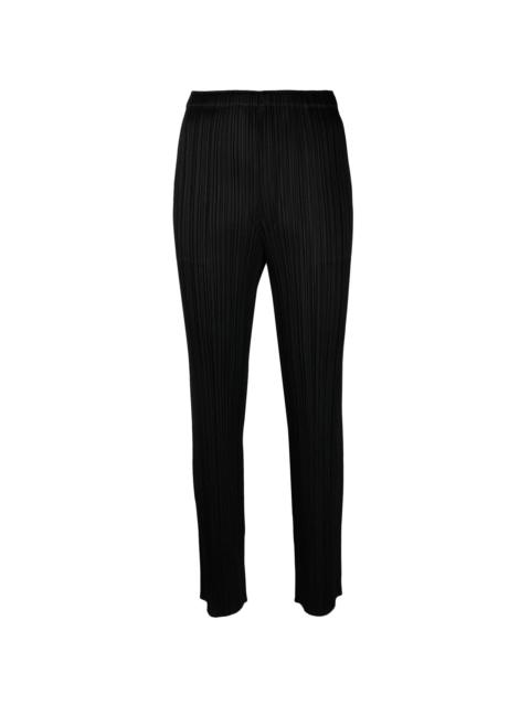 elasticated-waist slip-on straight trousers