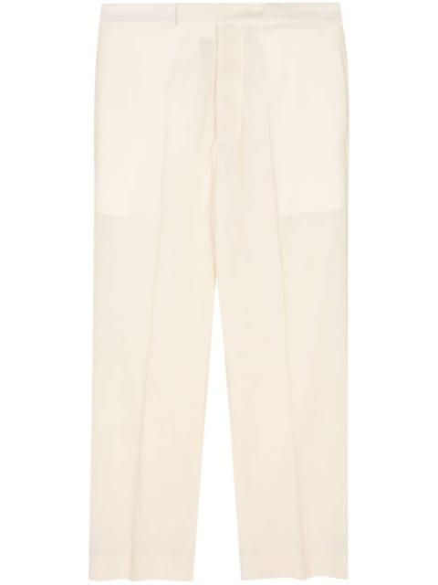 pressed-crease wool tapered trousers