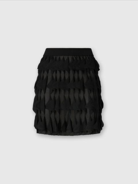 Short skirt with geometric tiers