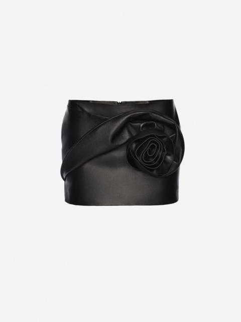 Rose-detail leather mini skirt in black