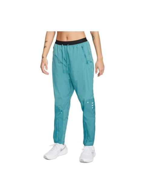(WMNS) Nike Therma-Fit Training Woven Trousers 'Teal' DX5554-440