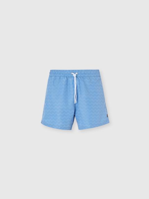 Mid-length swim shorts with tone-on-tone zigzag print