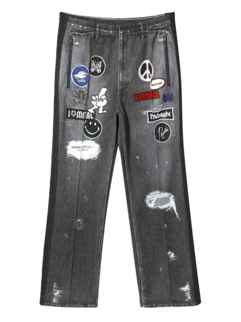 patch-detailing track jeans