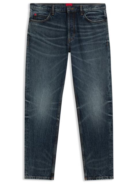 TAPERED-FIT JEANS IN BLUE STONEWASHED DENIM