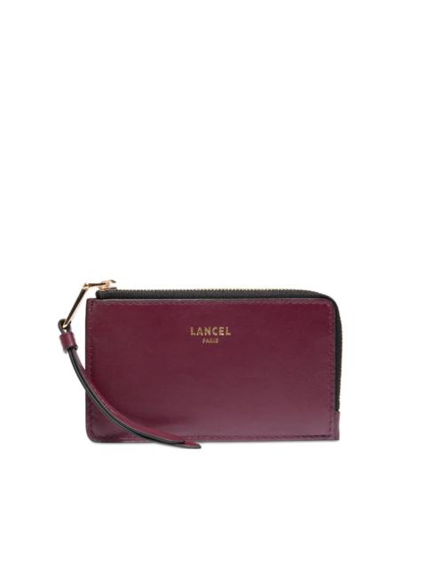 zip-fastening leather card holder