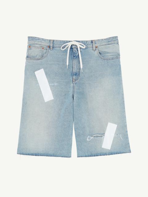 Taped denim shorts