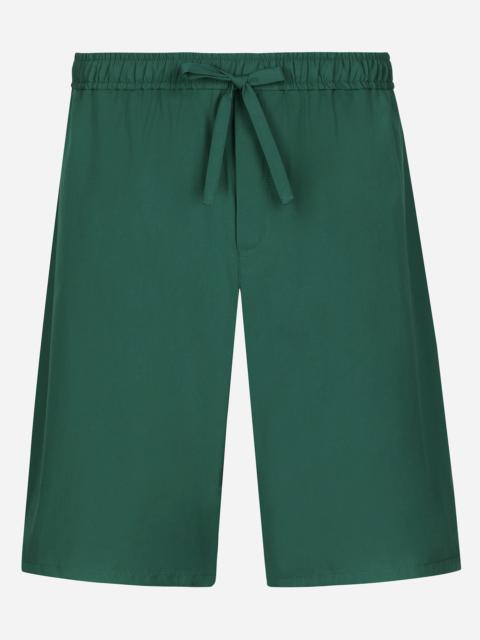 Cotton jogging shorts with logo tag