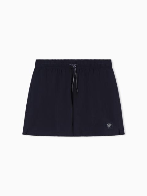 SWIM SHORTS WITH SATIN LABEL PATCH