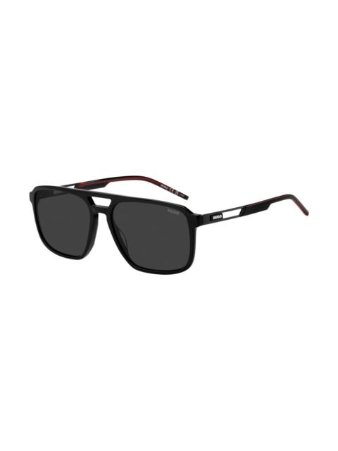 RUBBER-LOGO SUNGLASSES IN BLACK ACETATE