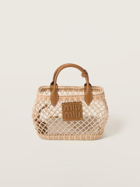 Woven fabric handbag with leather trim