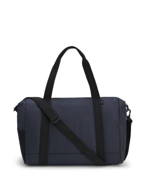 REFLECTIVE-DETAIL HOLDALL IN FAUX LEATHER