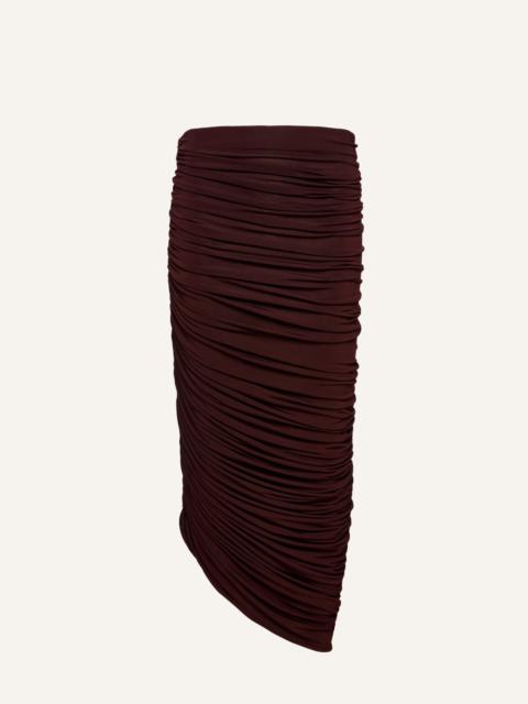 Asymmetrical draped midi skirt in bordeaux