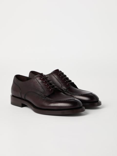 Burnished calfskin derbys