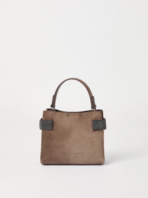 Essence small top-handle bag in suede with precious bands