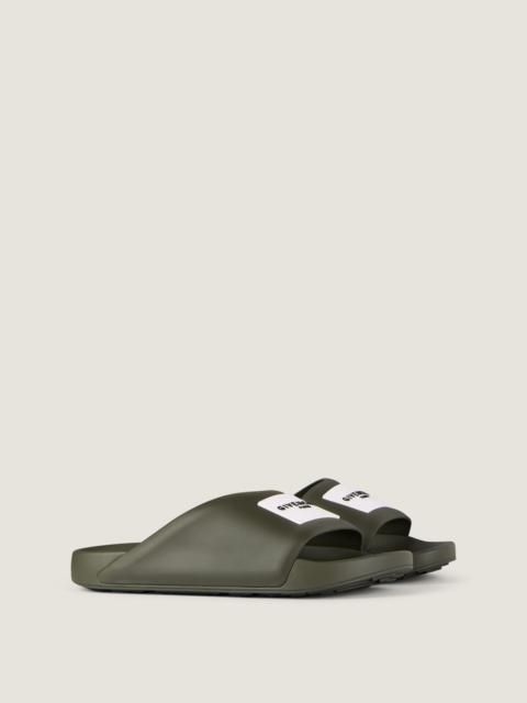 LABEL SLIDE FLAT MULES IN RUBBER