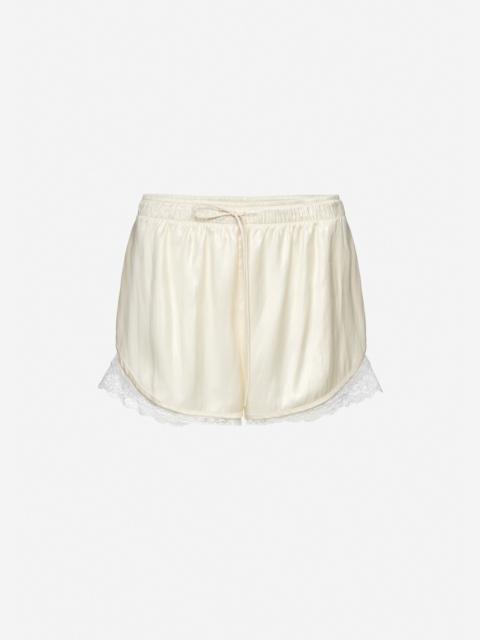 Lace-trim shorts in cream
