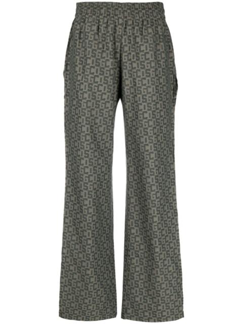 open-leg monogram trousers