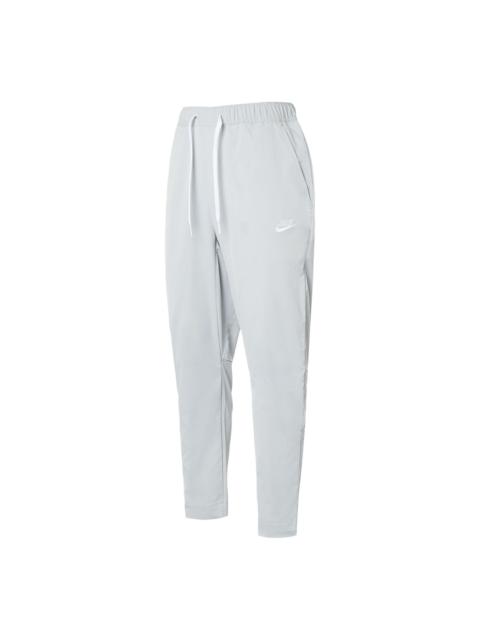 Nike Club Woven Tapered Leg Pants 'Light Smoke Gray White' DX0625-077