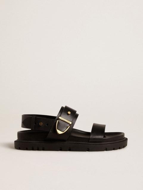 Women's Lucy sandal in glossy black leather with gold metal buckle