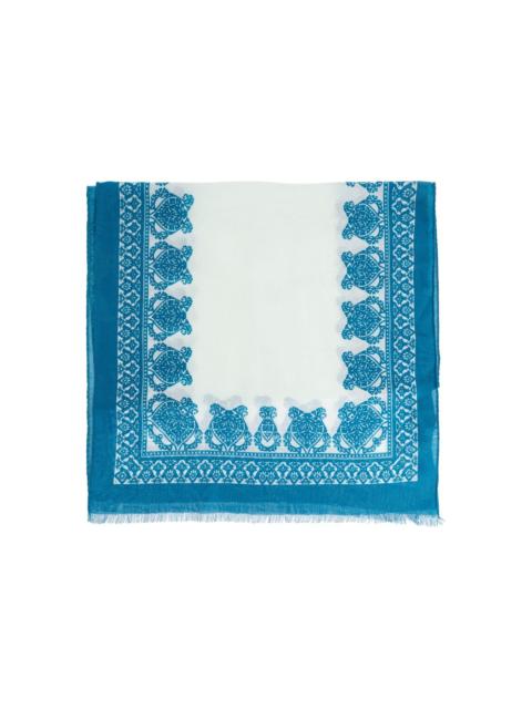 fringed patterned scarf