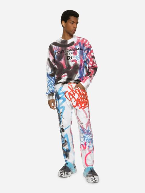 Loose jeans with spray-paint graffiti print