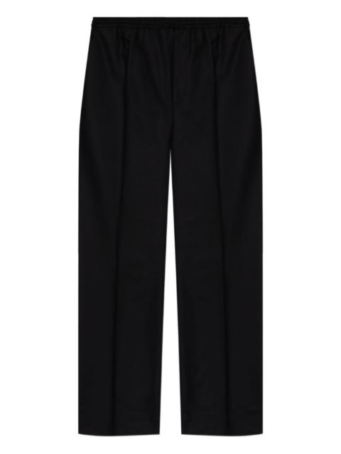 elasticated-waist gold-button trousers