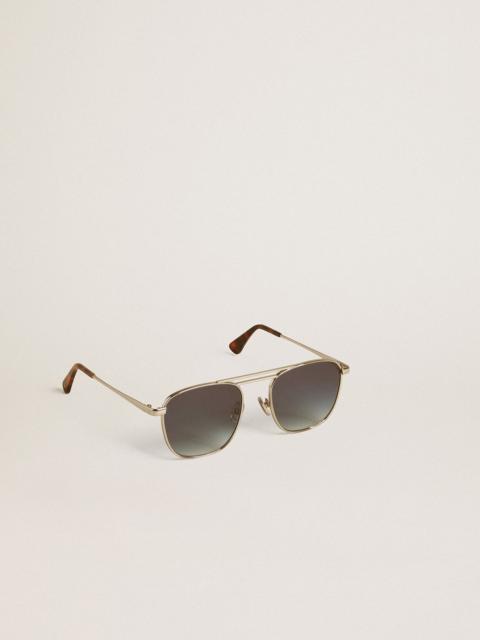 Aviator style sunglasses with silver frame and blue lenses