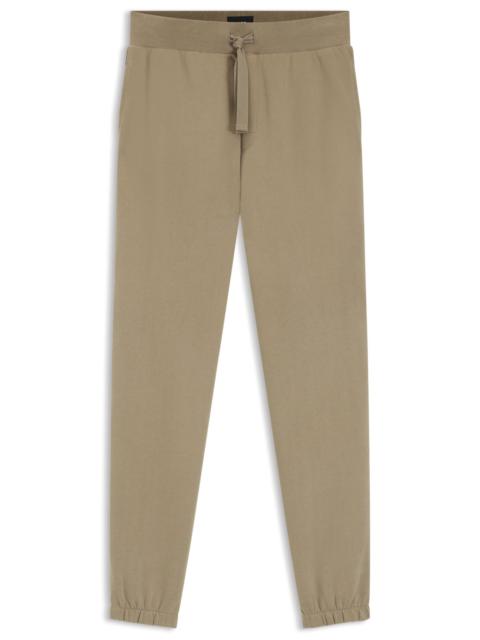 EMBROIDERED-LOGO TRACKSUIT BOTTOMS IN COTTON TERRY