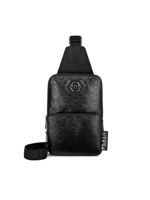 monogram-embossed crossbody bag